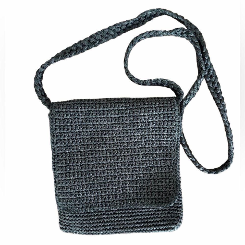 The Sak black crochet knit crossbody bag.